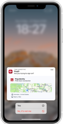 A screen capture of the PingID mobile app notification lock screen, asking if you are trying to sign on. The notification is marked Time Sensitive and shows a location map, area information, and device information, with Yes or No, it’s not me buttons.